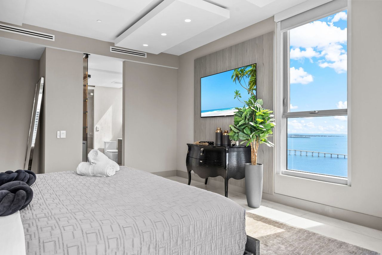 A guest bedroom looking down the bay