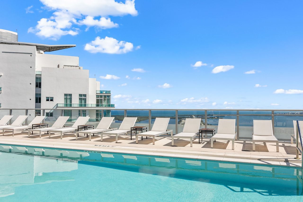 The building's rooftop pool, over the bay