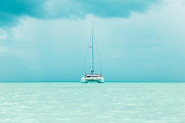 A private catamaran at sunrise