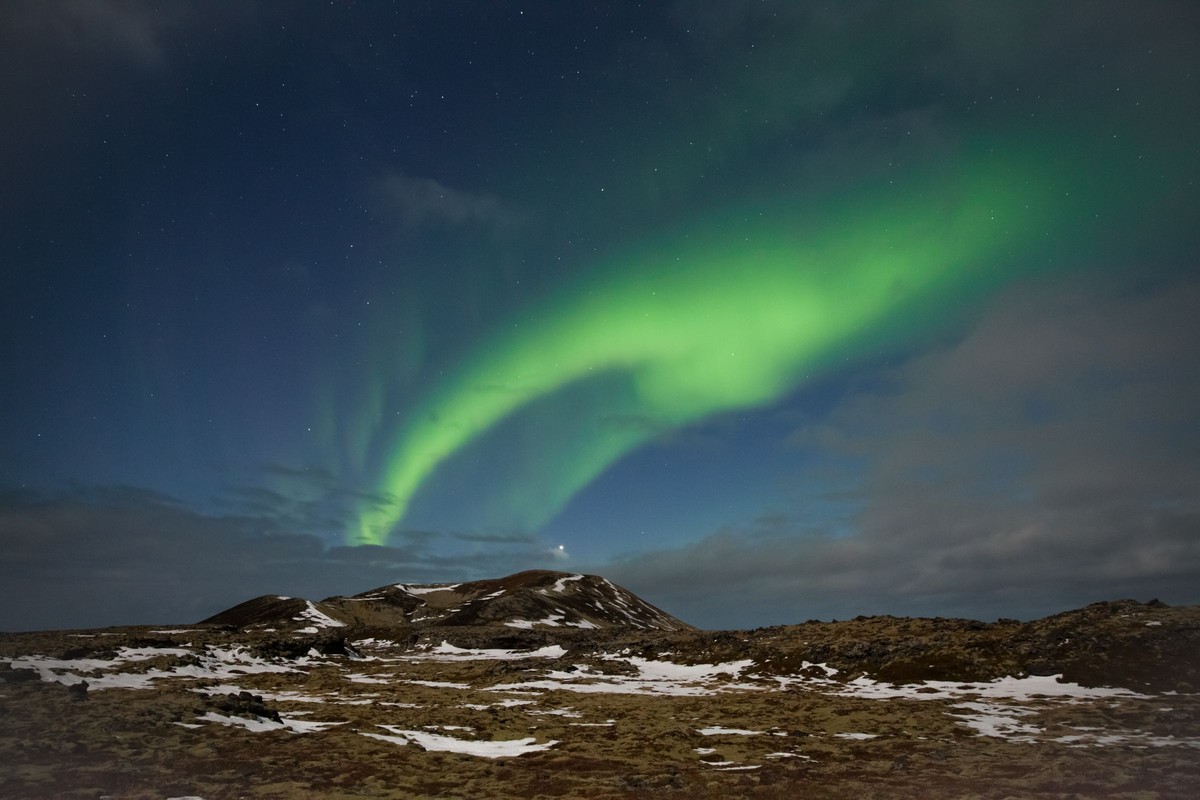 Aurora from a glass-roofed retreat