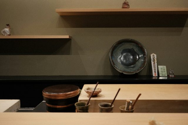 A sushi counter held for you